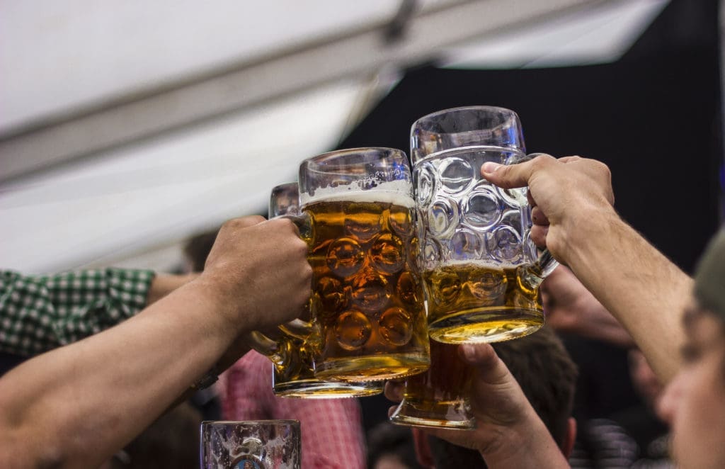 German,Beer,Stein,Glasses,Cheers,In,Oktoberfest.,Concept:,Beer,Drinking